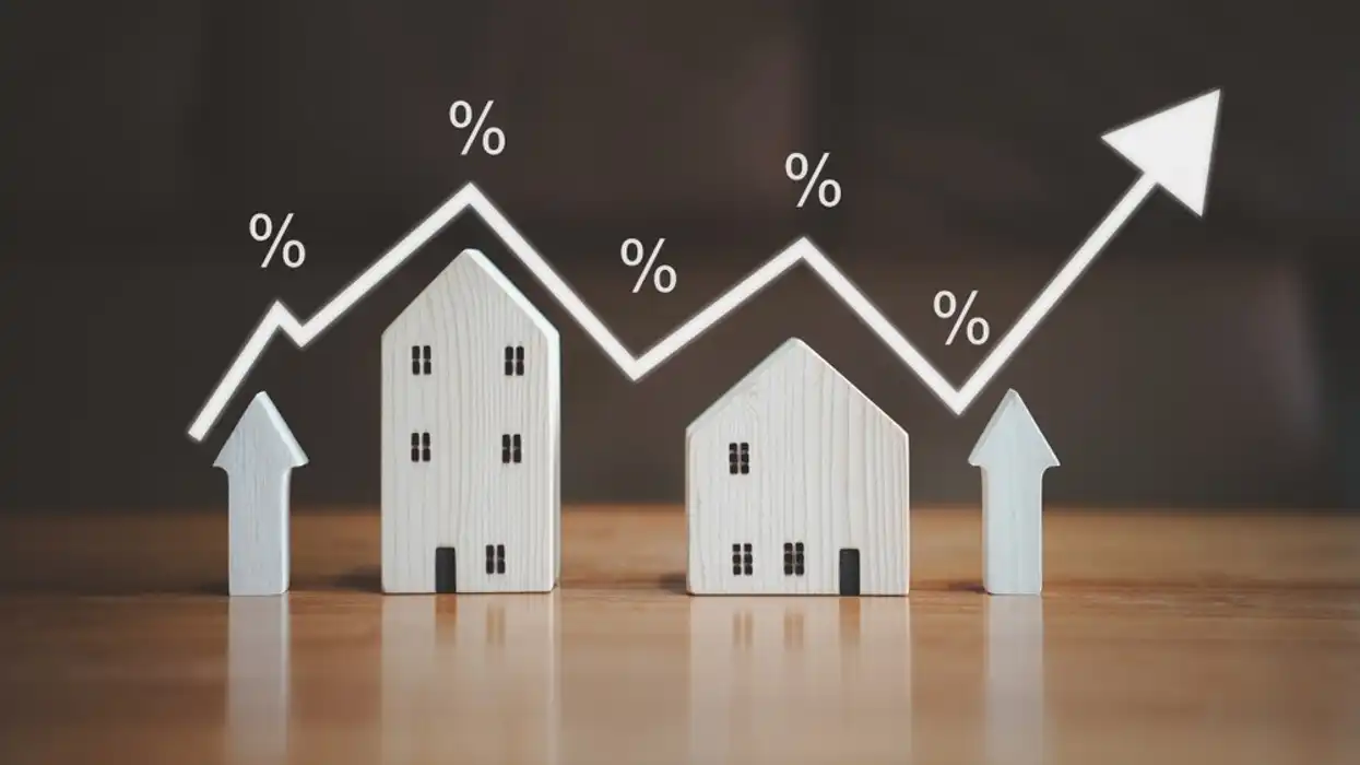 Wooden houses with upward trend graph